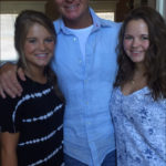 Monty with his two daughters