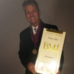 Monty Lane Allen wins BMI Songwriter Award for Glorybound with cowriter Robert Arthur